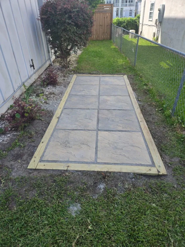 Completed backyard paver walkway installation