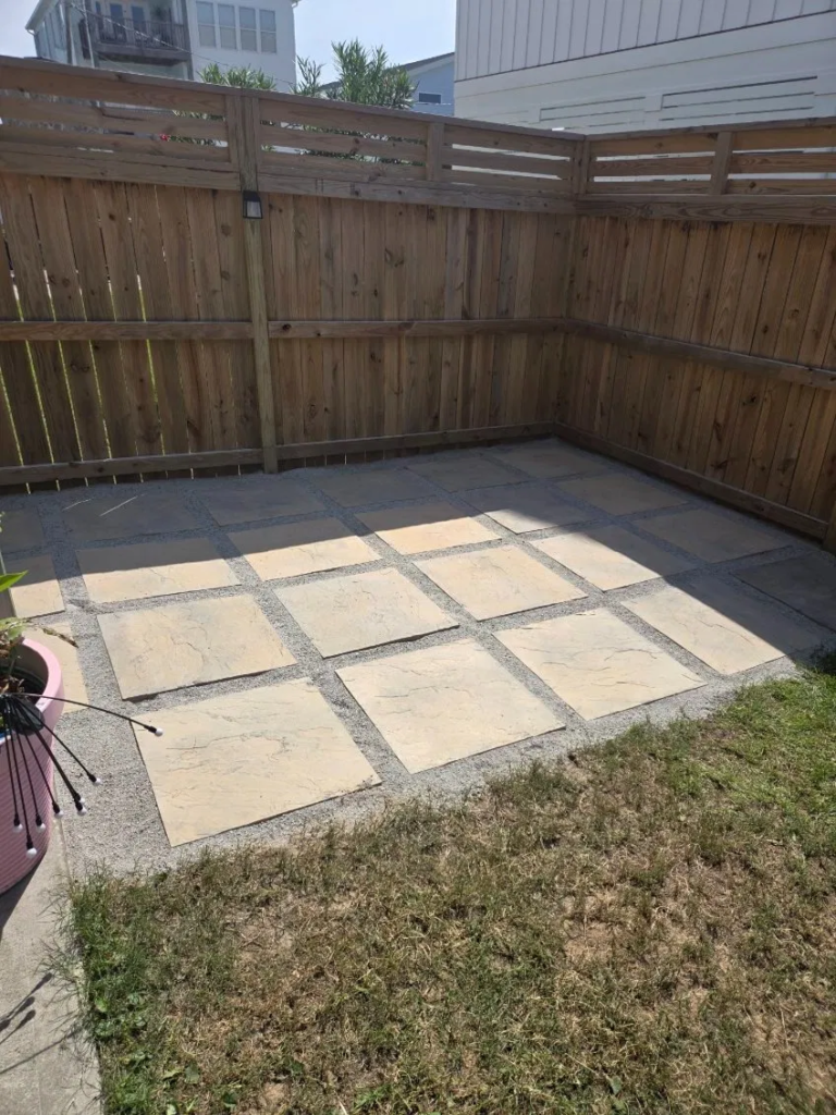 Paver pad installation in residential backyard