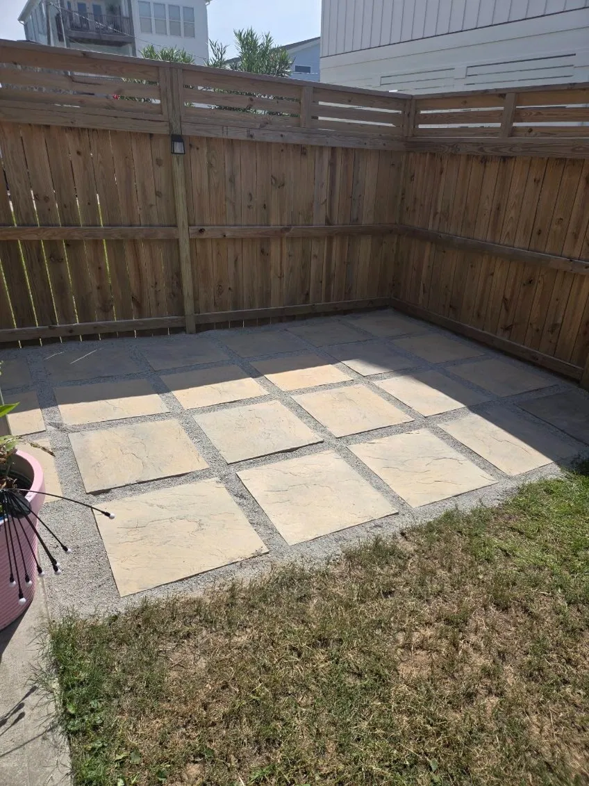 Paver pad installation in residential backyard